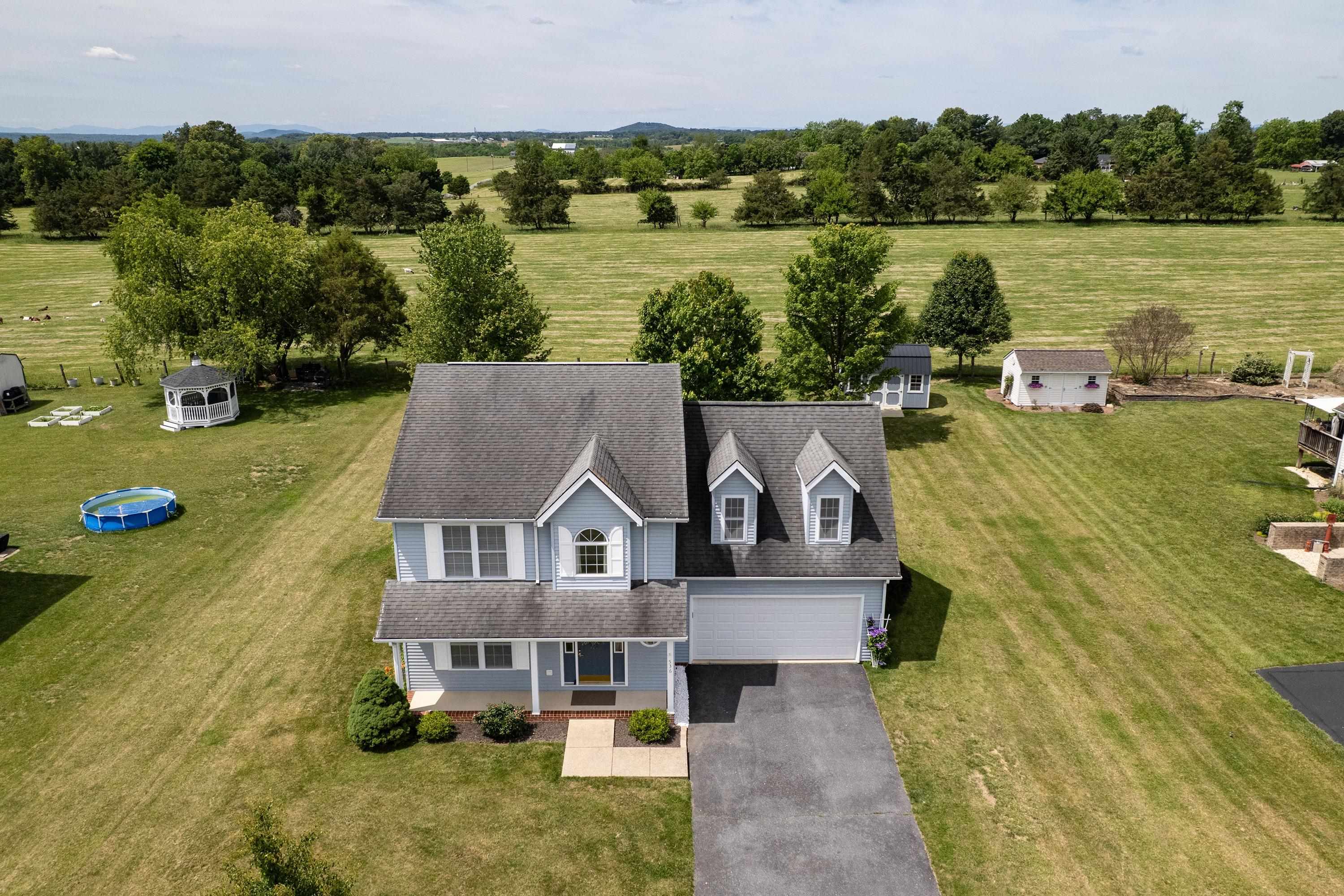 536 Three Leagues Road McGaheysville, VA 22840 - Photo 49 of 71 an aerial view of a house with a yard and lake view