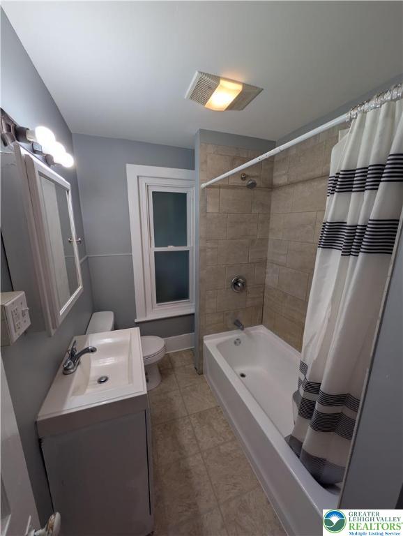 1027 Walnut Street, Unit 3 Allentown, PA 18102 - Photo 13 of 14 a bathroom with a sink a toilet and shower