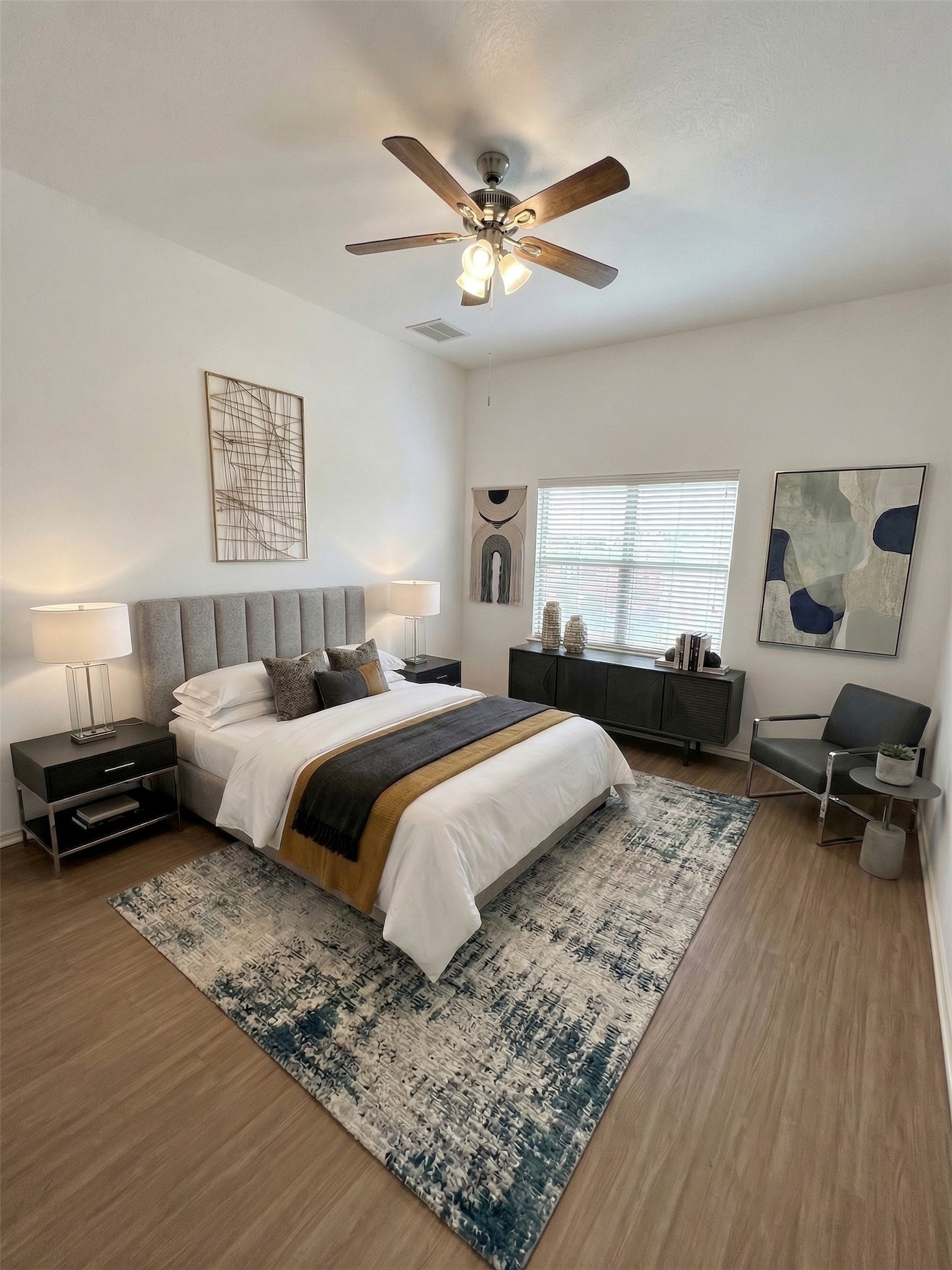 2122 Rachel Lane Round Rock, TX 78664 - Photo 7 of 15 a bedroom with a bed and wooden floor