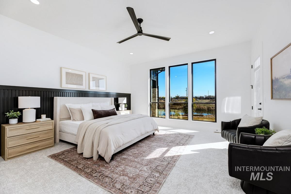 525 Founder Avenue Middleton, ID 83644 - Photo 23 of 50 Bedroom with light colored carpet, ceiling fan, a water view, and recessed lighting