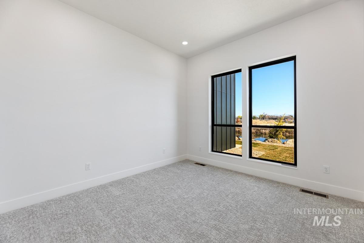 525 Founder Avenue Middleton, ID 83644 - Photo 41 of 50 Empty room featuring carpet and recessed lighting