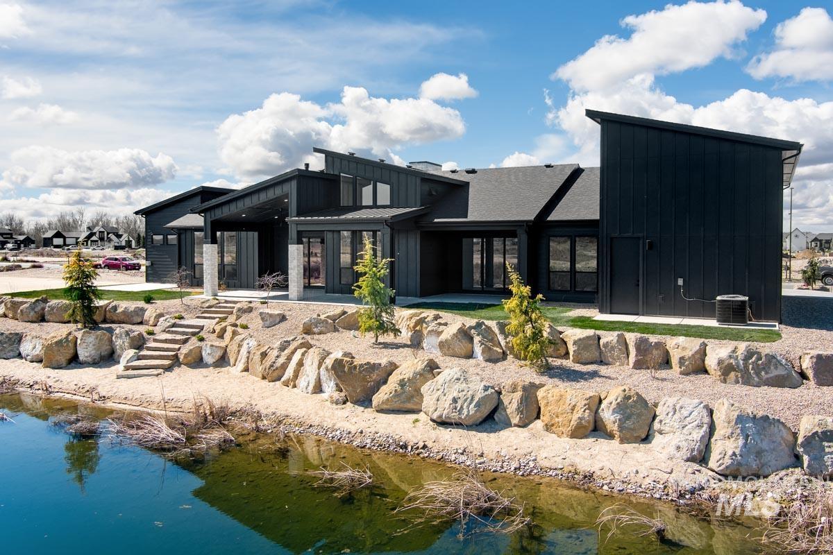 525 Founder Avenue Middleton, ID 83644 - Photo 47 of 50 Rear view of house featuring board and batten siding and a patio