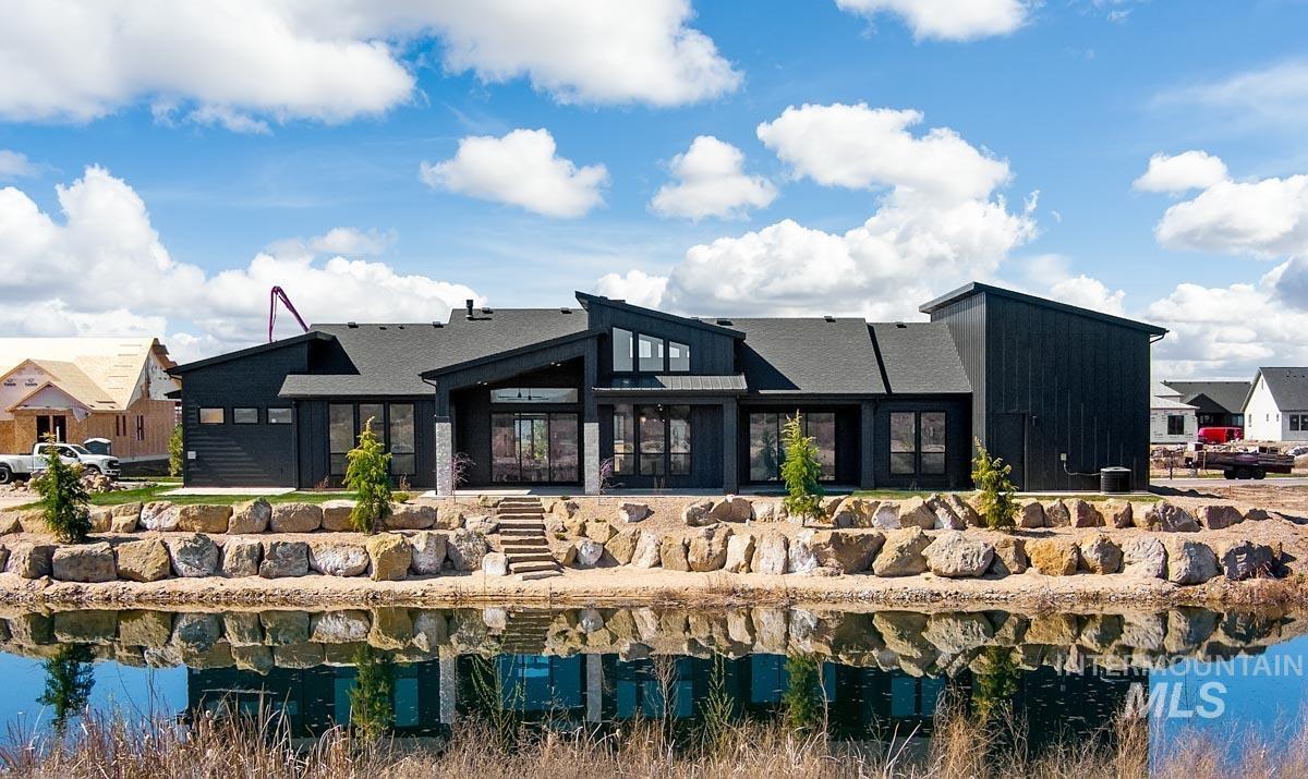 525 Founder Avenue Middleton, ID 83644 - Photo 48 of 50 Back of house featuring a water view and a patio