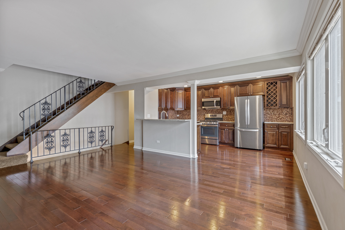 1004 Inverrary Lane Deerfield, IL 60015 - Photo 4 of 19 a view interior of a house and an entryway with wooden floor