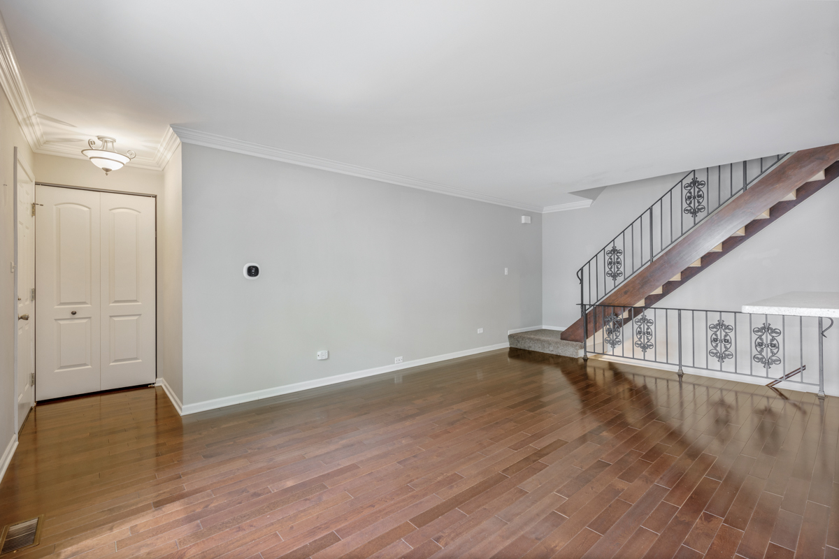 1004 Inverrary Lane Deerfield, IL 60015 - Photo 5 of 19 a view of entryway with wooden floor