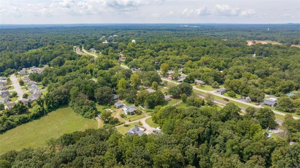 131 Caudell Drive Lula, GA 30554 - Photo 68 of 68 an aerial view of residential houses with outdoor space and trees