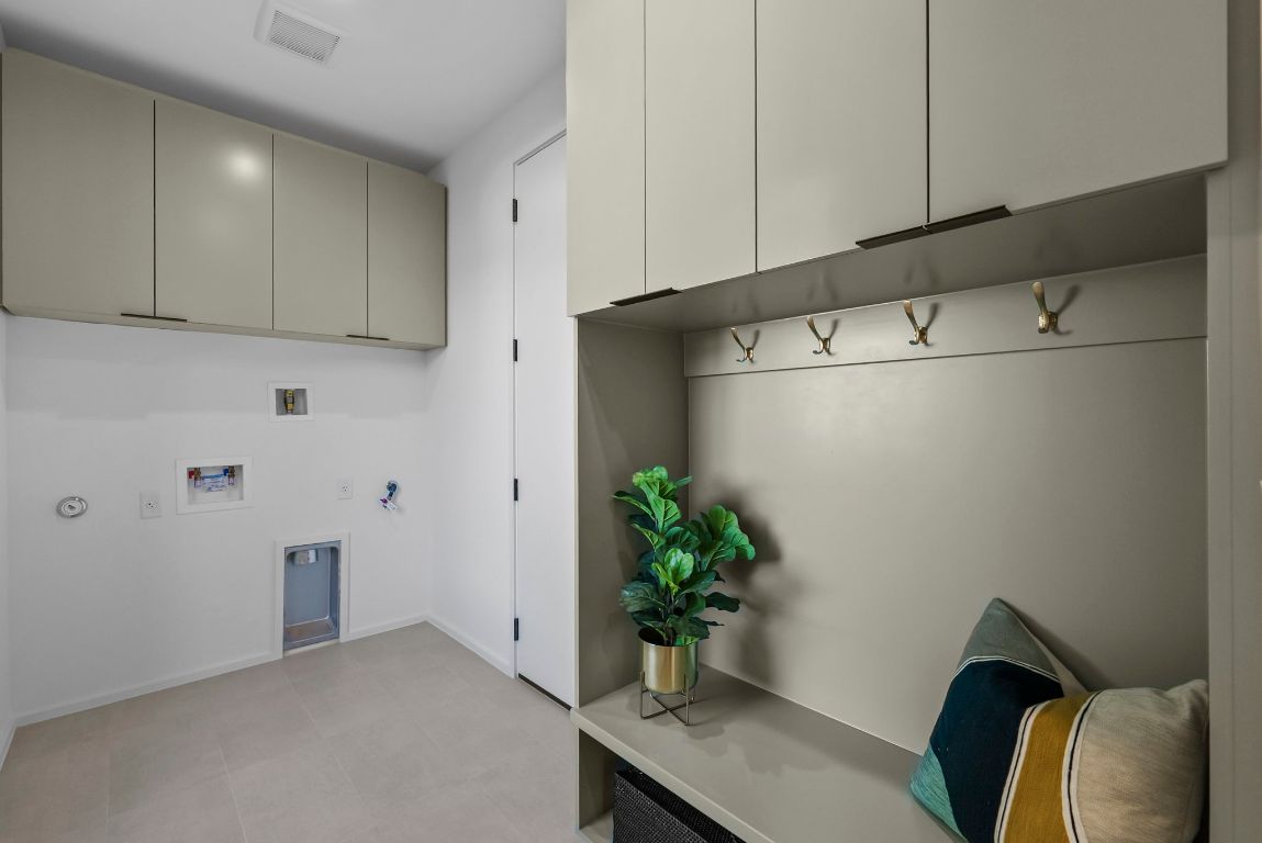 1216 Arcadia Avenue, Unit 2 Austin, TX 78757 - Photo 12 of 14 a view of cabinets with potted plant