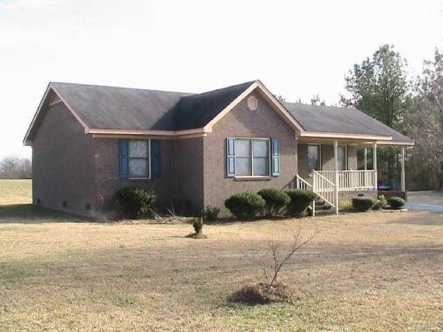 652 Old Stage Road North Coats, NC 27521 - Photo 2 of 10 a front view of a house with a yard