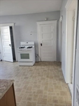 8 Knowlton Avenue Worcester, MA 01603 - Photo 11 of 35 a view of kitchen with microwave and stove