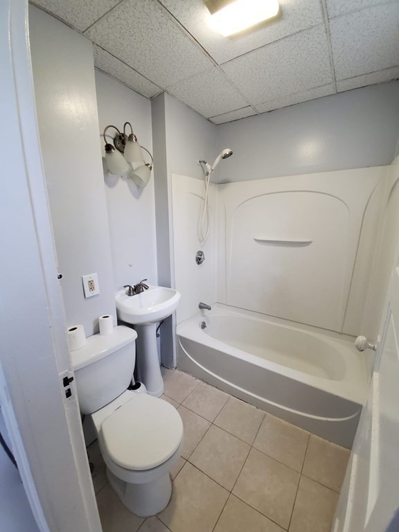 8 Knowlton Avenue Worcester, MA 01603 - Photo 12 of 35 a bathroom with a toilet and a bathtub