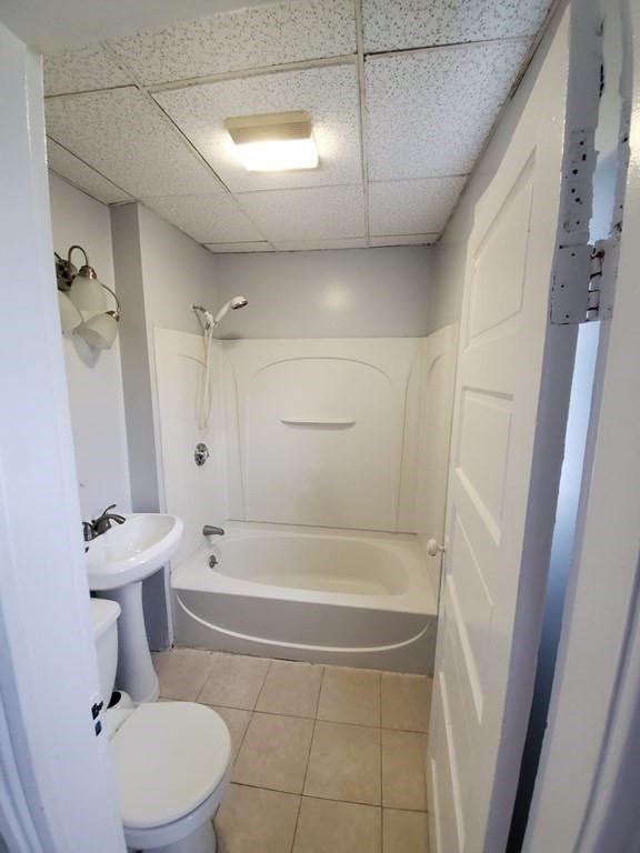 8 Knowlton Avenue Worcester, MA 01603 - Photo 13 of 35 a bathroom with a toilet and a shower