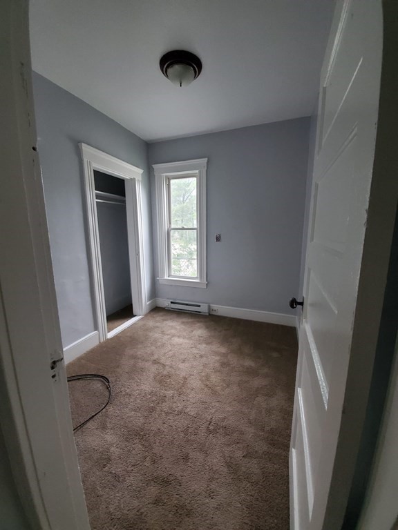 8 Knowlton Avenue Worcester, MA 01603 - Photo 17 of 35 a view of an empty room with a window