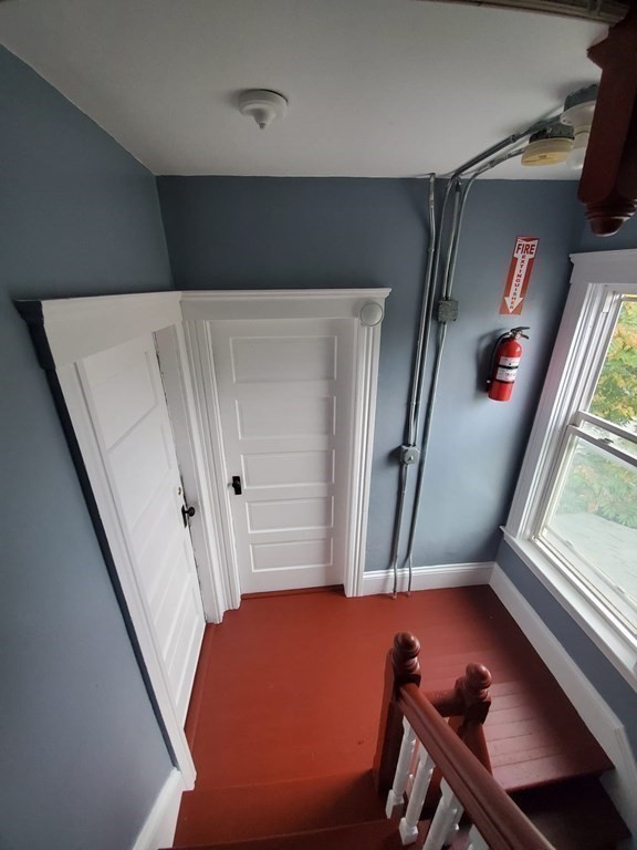 8 Knowlton Avenue Worcester, MA 01603 - Photo 22 of 35 a view of a hallway with staircase