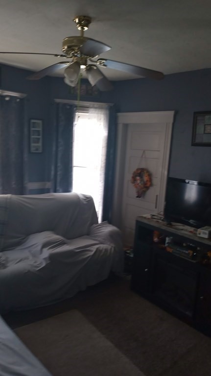 8 Knowlton Avenue Worcester, MA 01603 - Photo 23 of 35 a living room with furniture and a flat screen tv