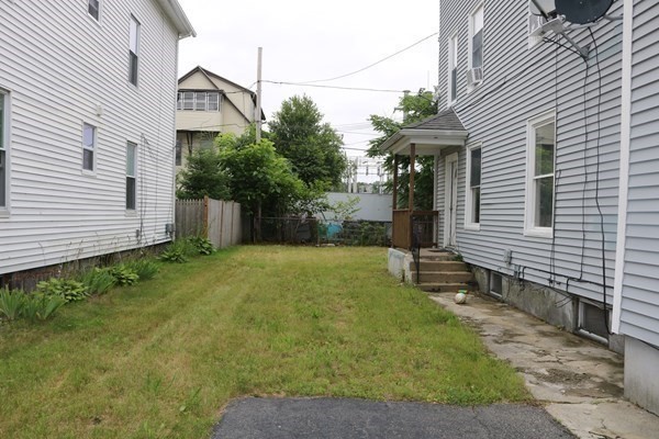 8 Knowlton Avenue Worcester, MA 01603 - Photo 33 of 35 a front view of a house with garden