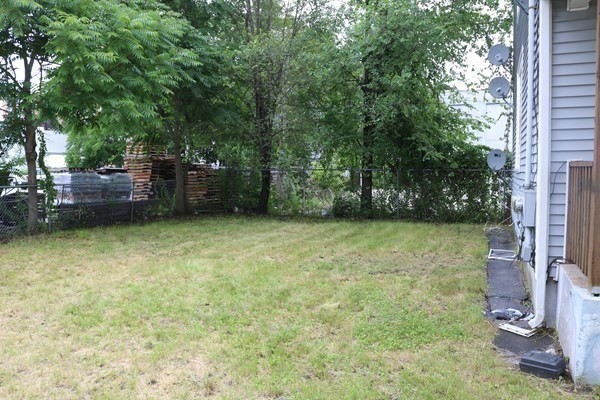 8 Knowlton Avenue Worcester, MA 01603 - Photo 34 of 35 a backyard of a house with barbeque oven