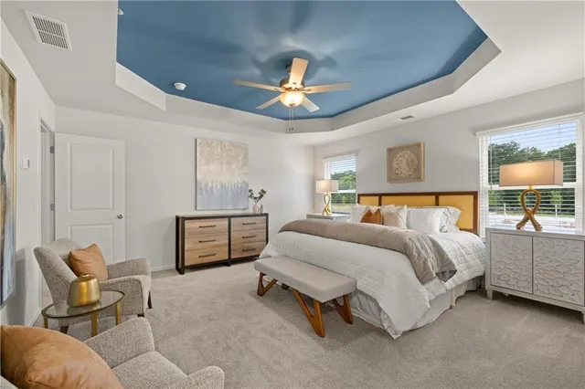 a bedroom with a bed and furniture