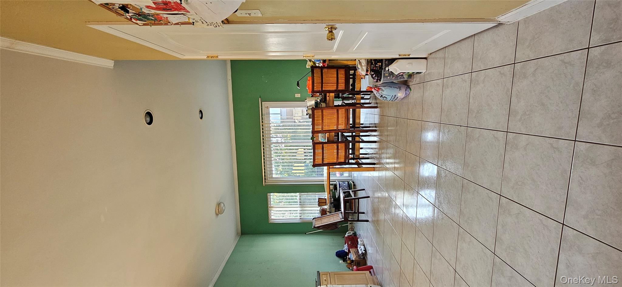 29 Marisa Court Staten Island, NY 10314 - Photo 13 of 15 a room with furniture and a large window