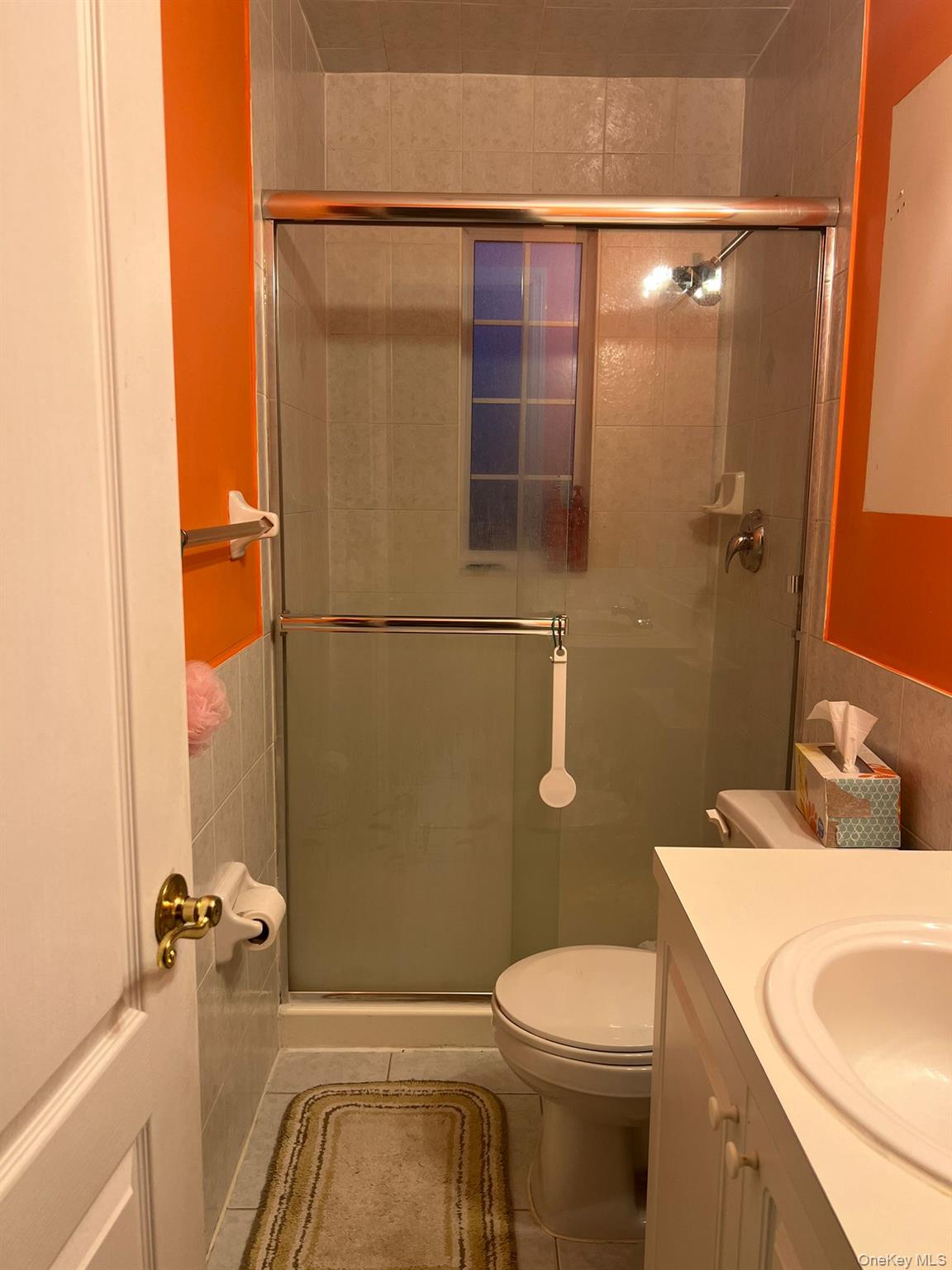 29 Marisa Court Staten Island, NY 10314 - Photo 8 of 15 a bathroom with a sink a toilet and shower