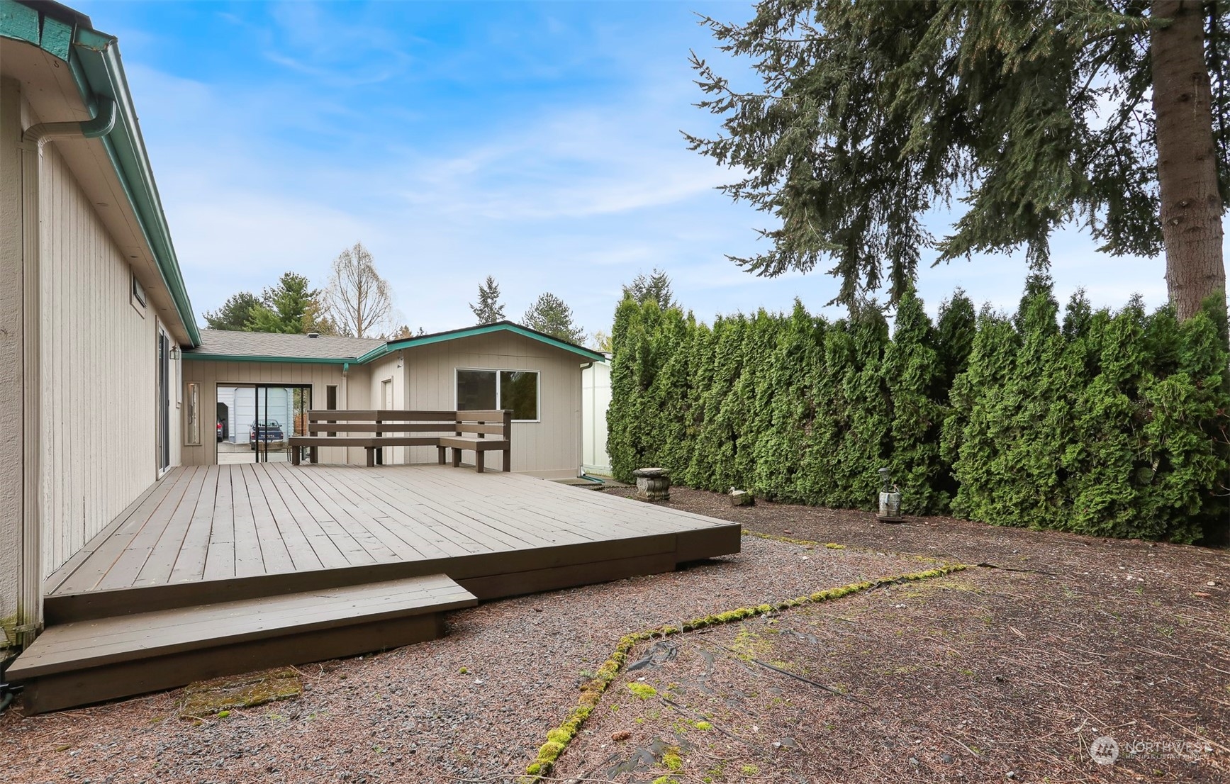 24010 10th Place West Bothell, WA 98021 - Photo 37 of 40 a view of a house with backyard and a tree