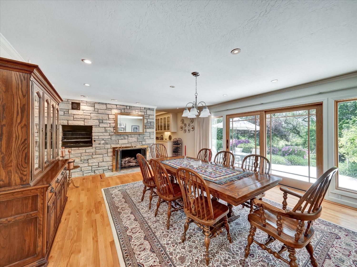 6410 Bennett Valley Road Santa Rosa, CA 95404 - Photo 12 of 34 Formal dinning room with butlers pantry and fire place.