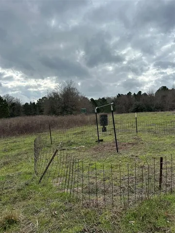 a view of a lake with a big yard