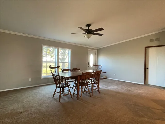 a view of a dining room and livingroom view