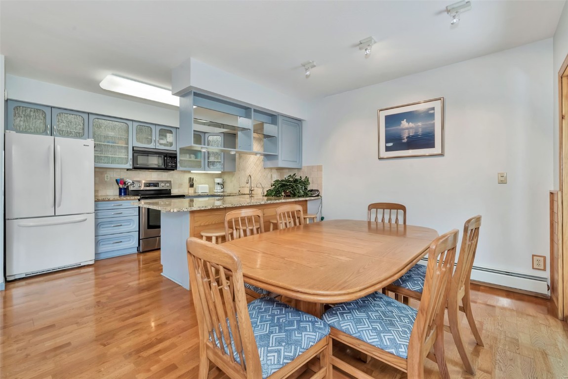 2116 Aster Place Steamboat Springs, CO 80487 - Photo 12 of 42 a view of a dining room with furniture