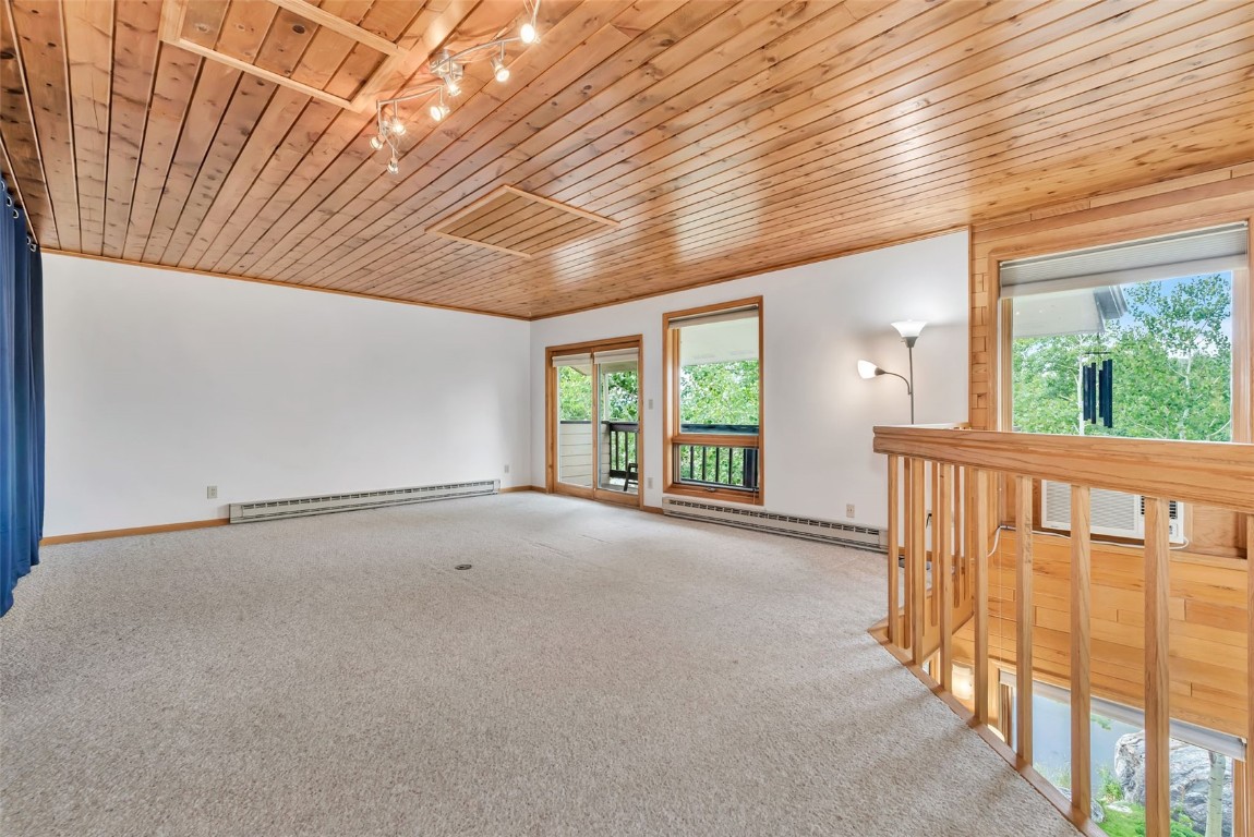 2116 Aster Place Steamboat Springs, CO 80487 - Photo 25 of 42 a view of an empty room with windows