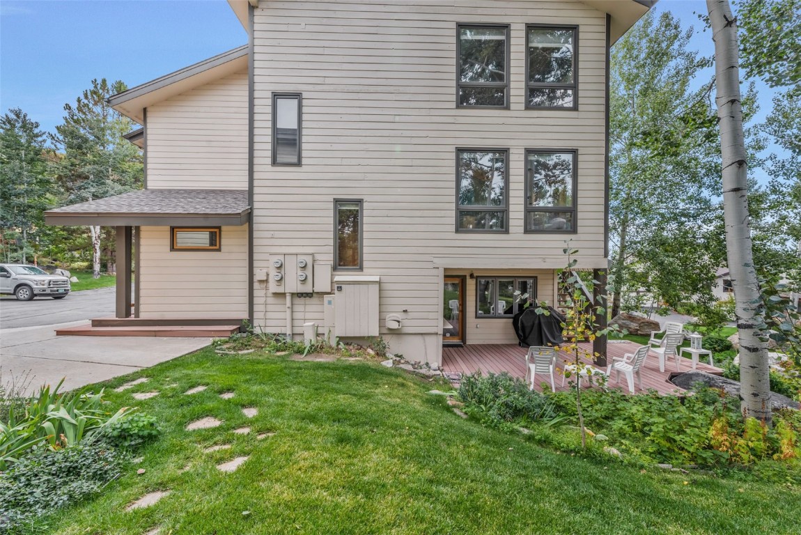 2116 Aster Place Steamboat Springs, CO 80487 - Photo 31 of 42 front view of a house with a yard
