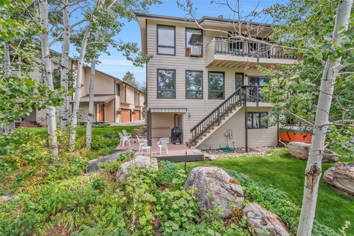 2116 Aster Place Steamboat Springs, CO 80487 - Photo 32 of 42 a view of a house with a yard and sitting area