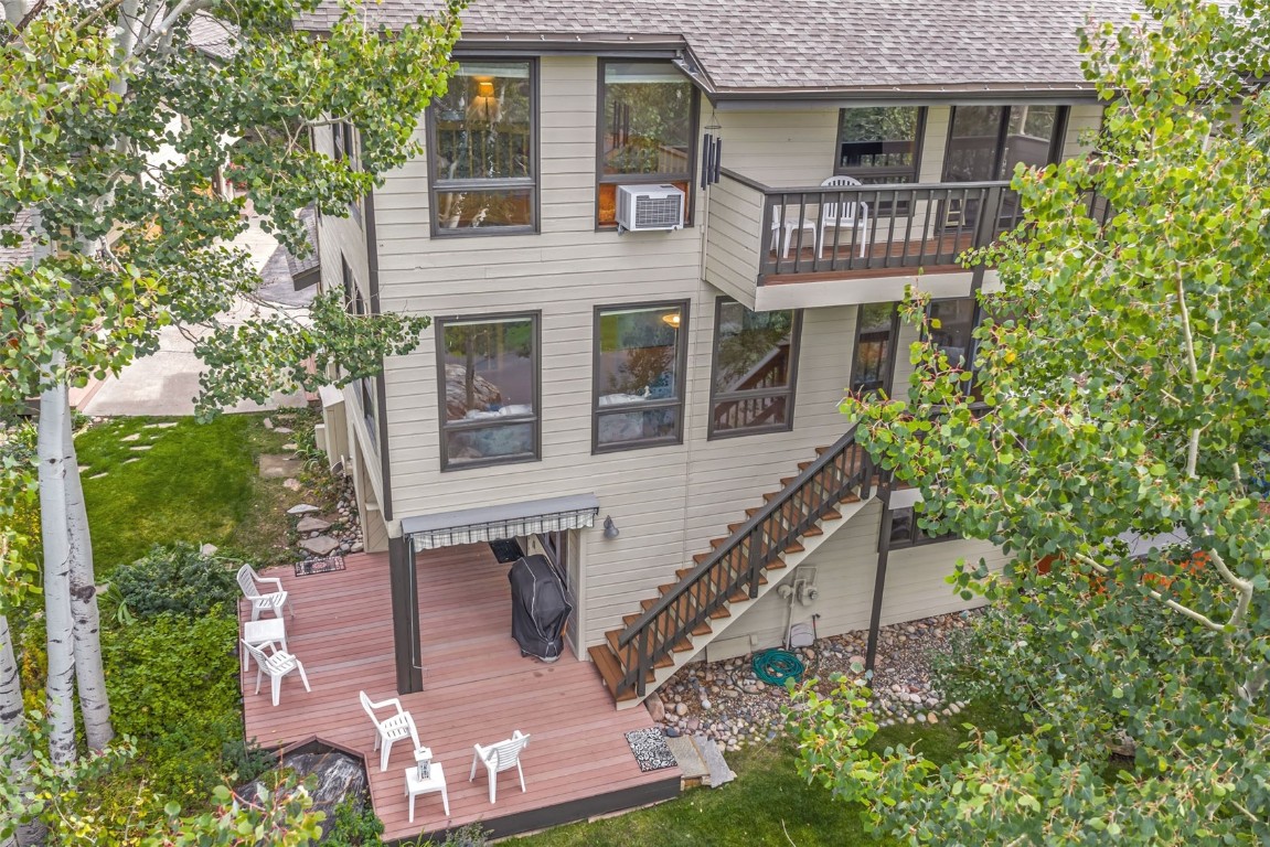 2116 Aster Place Steamboat Springs, CO 80487 - Photo 41 of 42 front view of a house with a yard