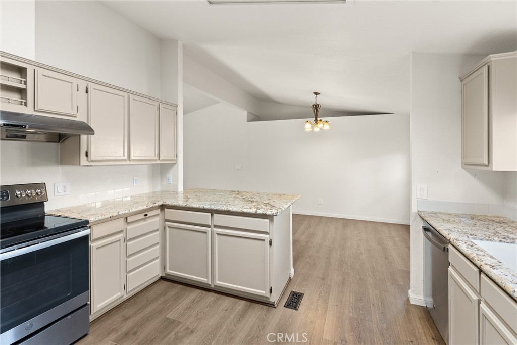 2050 Springfield Drive, Unit 212 Chico, CA 95928 - Photo 17 of 25 Kitchen Open to Dining Area