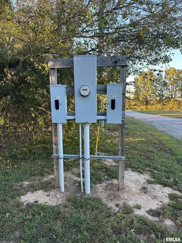 a view of a field and trees around
