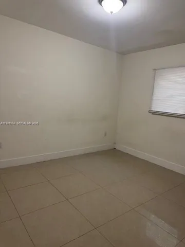 a view of a room with an empty space