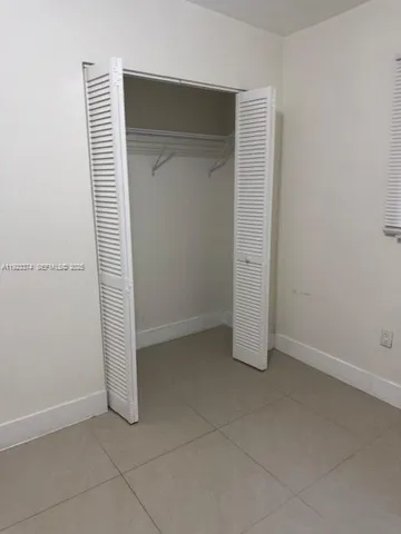 an empty room with closet
