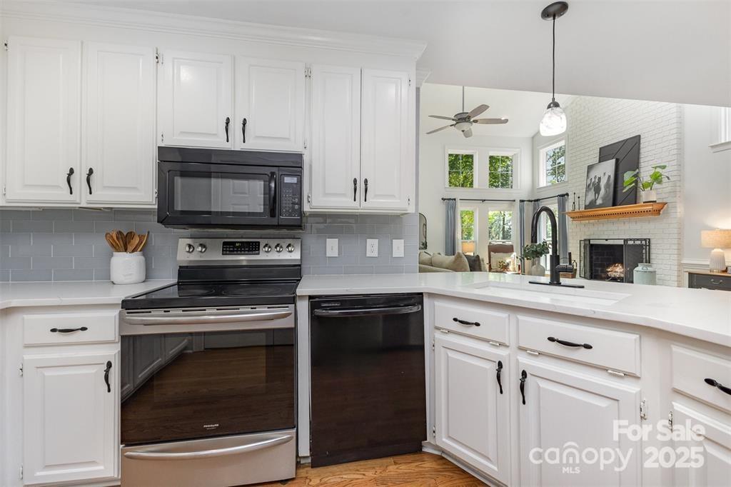 6639 Camp Creek Road Lancaster, SC 29720 - Photo 14 of 42 a kitchen with cabinets appliances and a counter space
