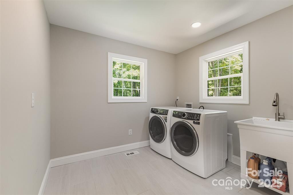 6639 Camp Creek Road Lancaster, SC 29720 - Photo 26 of 42 a utility room with dryer and washer
