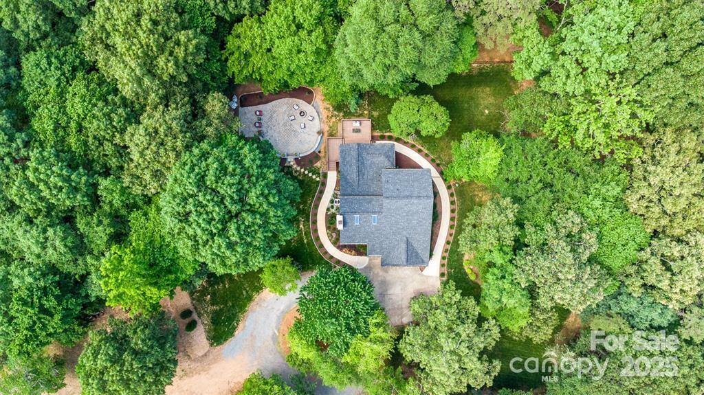 6639 Camp Creek Road Lancaster, SC 29720 - Photo 41 of 42 an aerial view of a house with a yard and trees all around