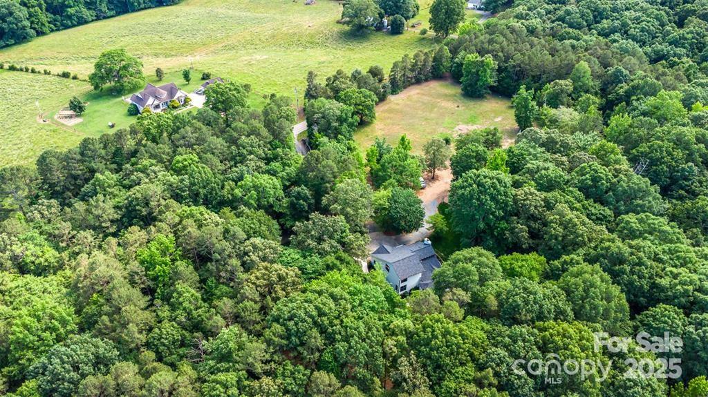 6639 Camp Creek Road Lancaster, SC 29720 - Photo 42 of 42 a view of a garden with a house