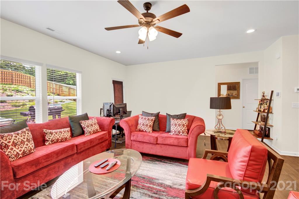 9026 Colwick Hill Road Charlotte, NC 28215 - Photo 11 of 21 a living room with furniture and a window