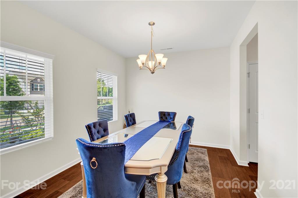 9026 Colwick Hill Road Charlotte, NC 28215 - Photo 6 of 21 a view of a dining room with furniture window and outside view