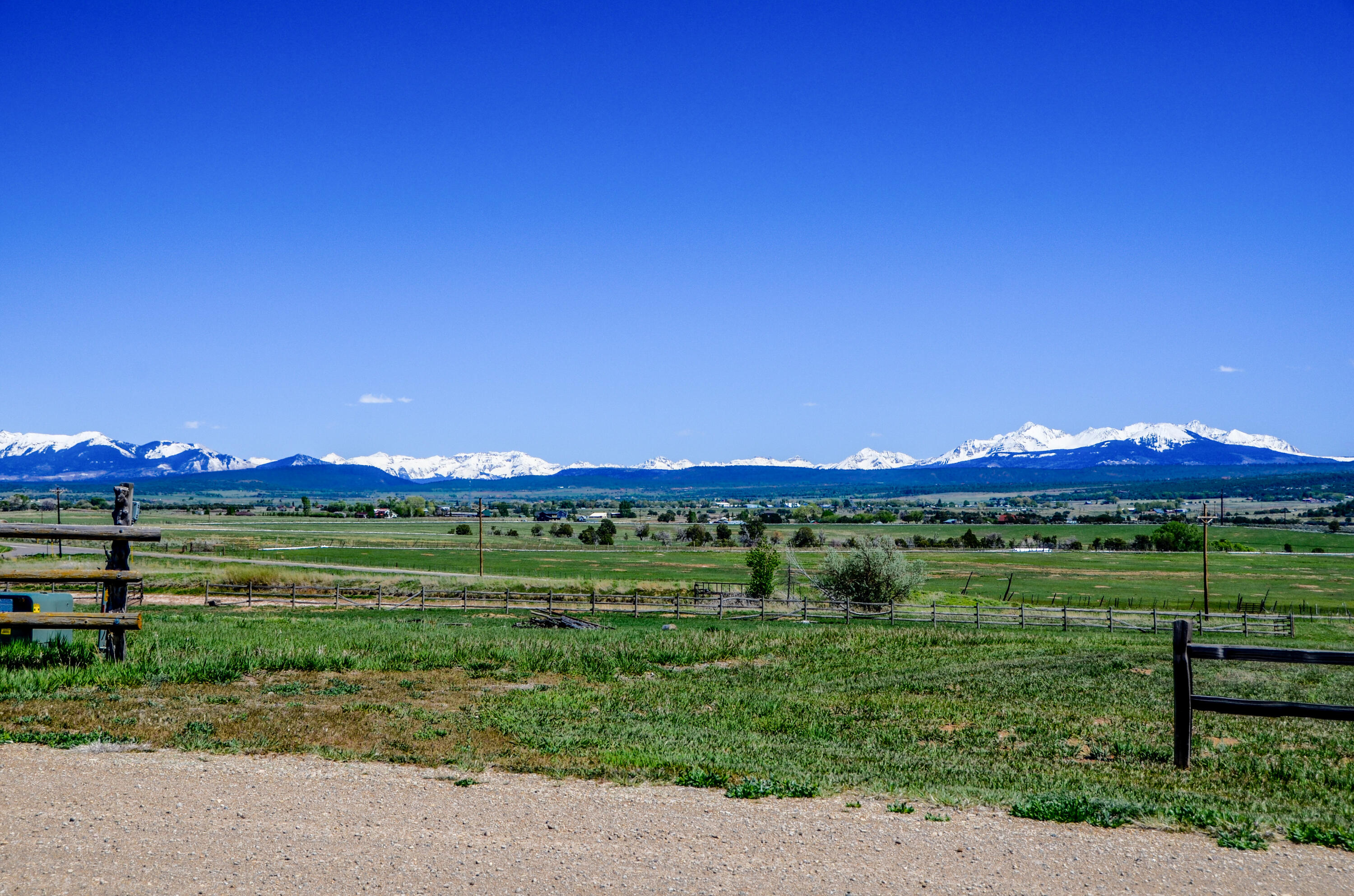 a view of a big yard next to a yard