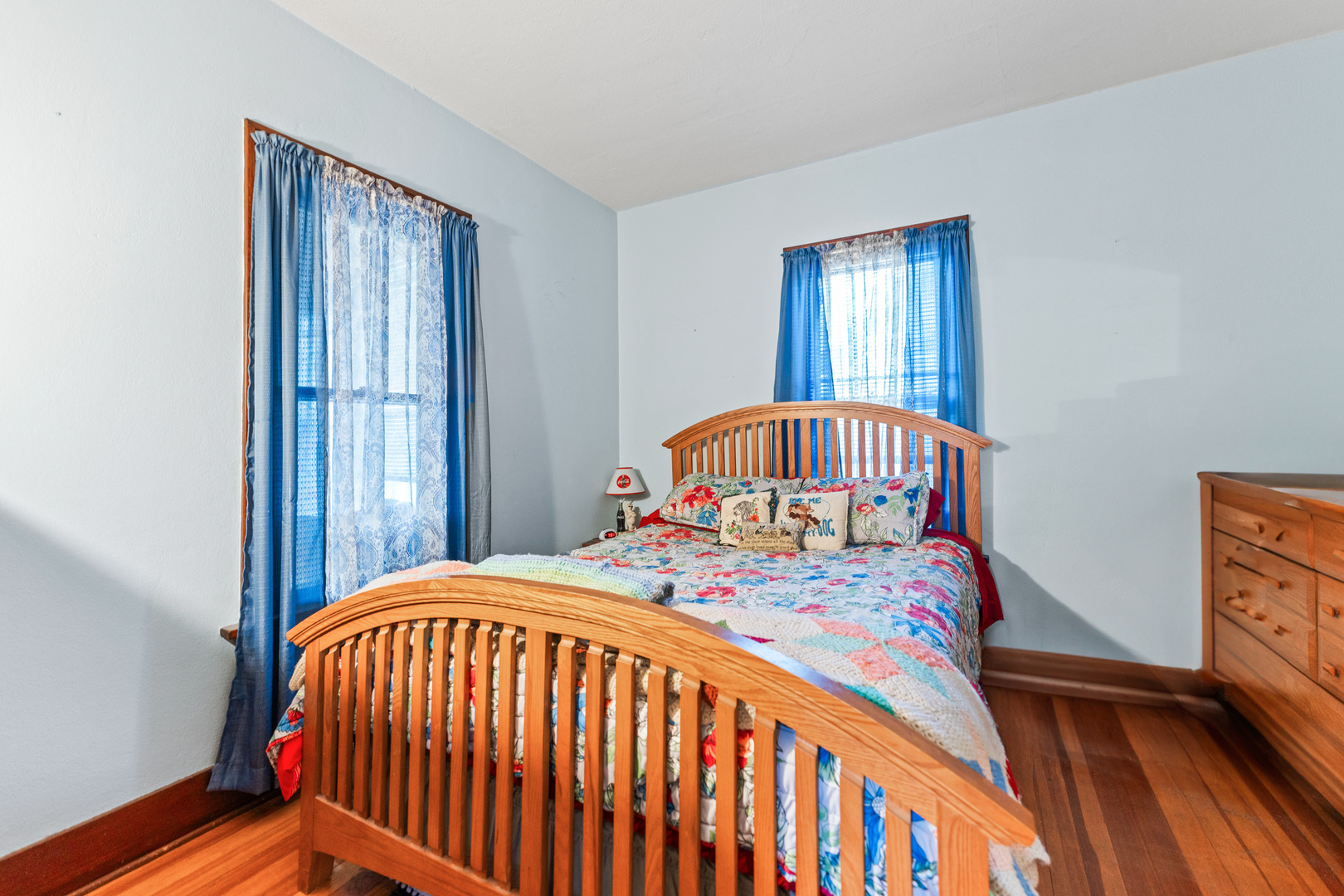 1100 Sycamore Road DeKalb, IL 60115 - Photo 11 of 24 a bedroom with a bed next to a window