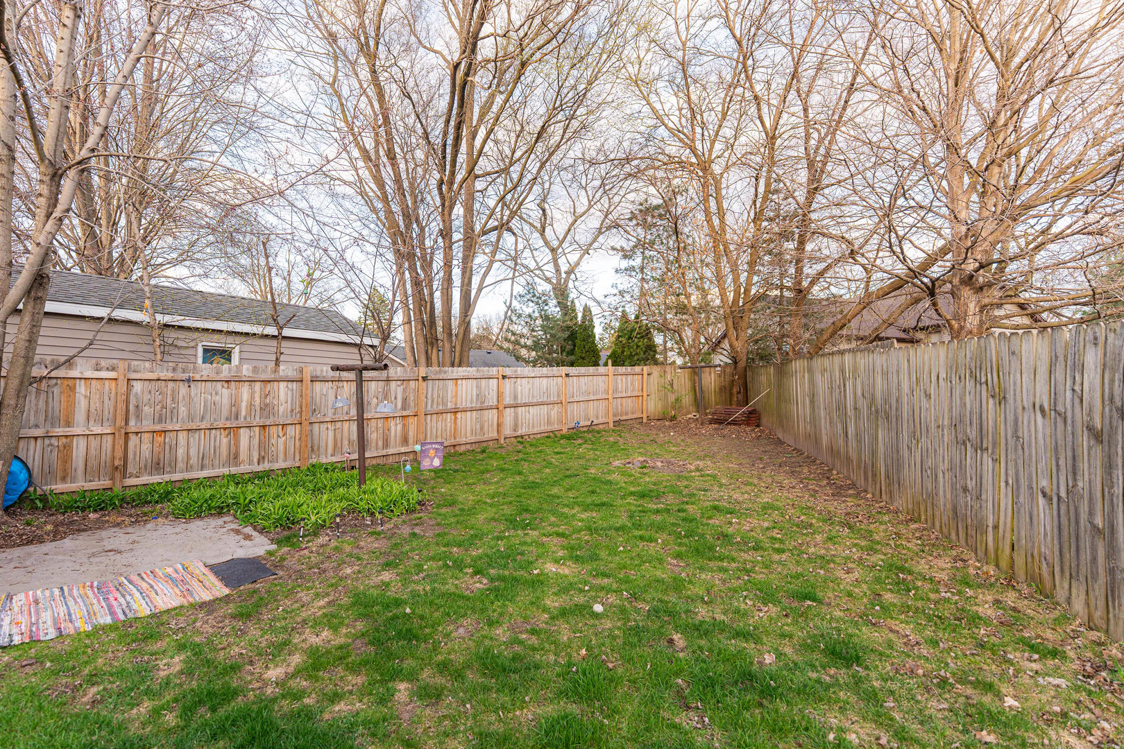 1100 Sycamore Road DeKalb, IL 60115 - Photo 23 of 24 a view of backyard with wooden fence