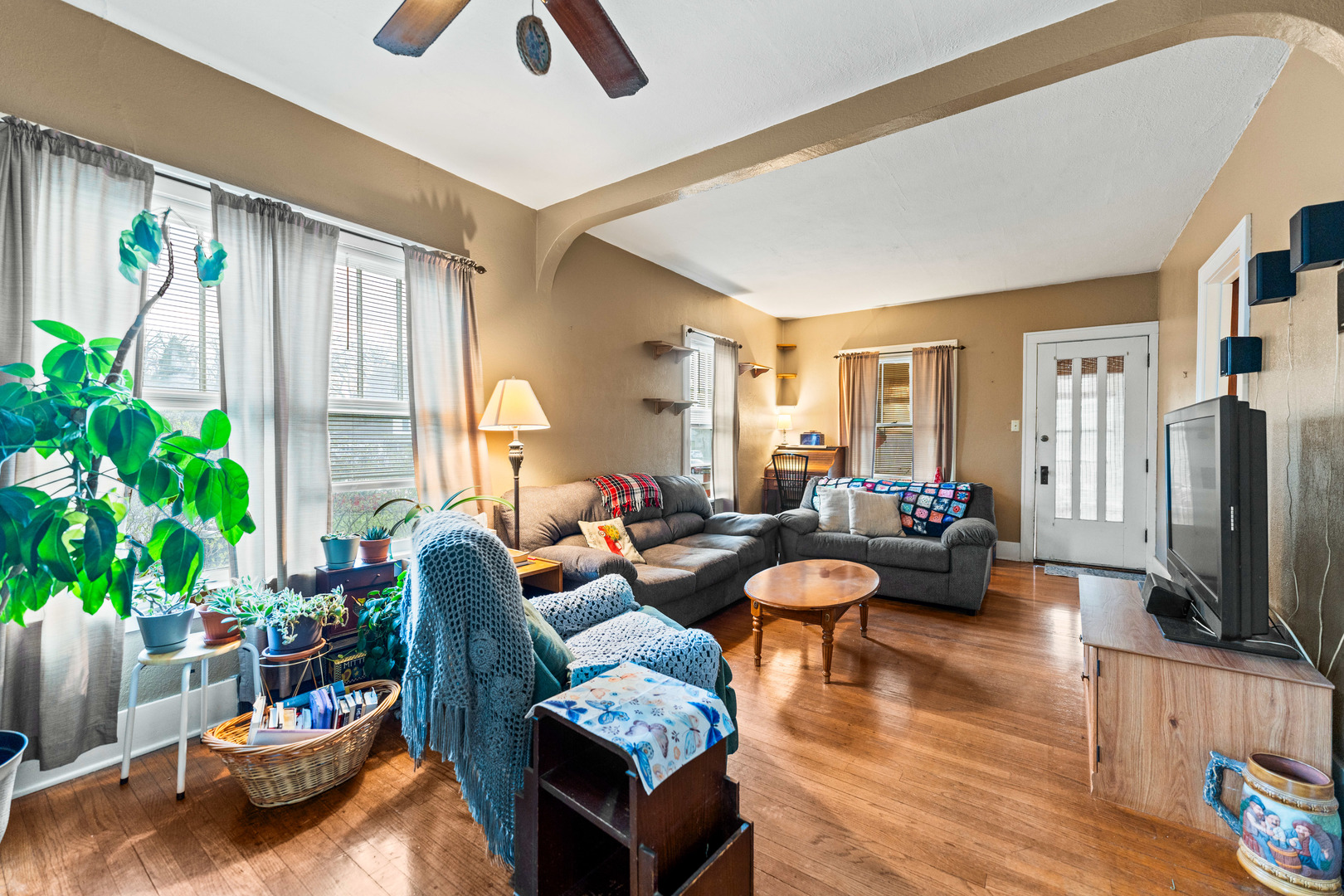 1100 Sycamore Road DeKalb, IL 60115 - Photo 5 of 24 a living room with furniture fireplace and a large window