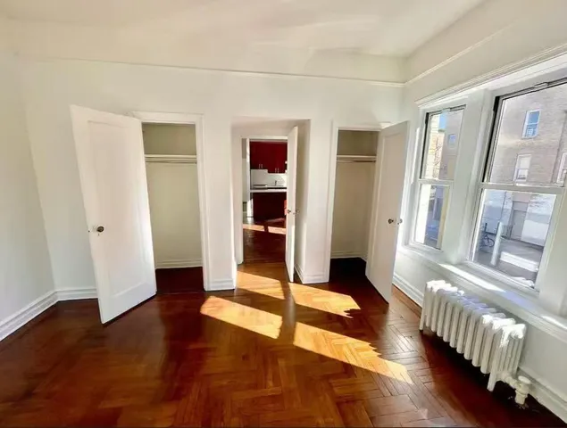 a view of entryway with wooden floor