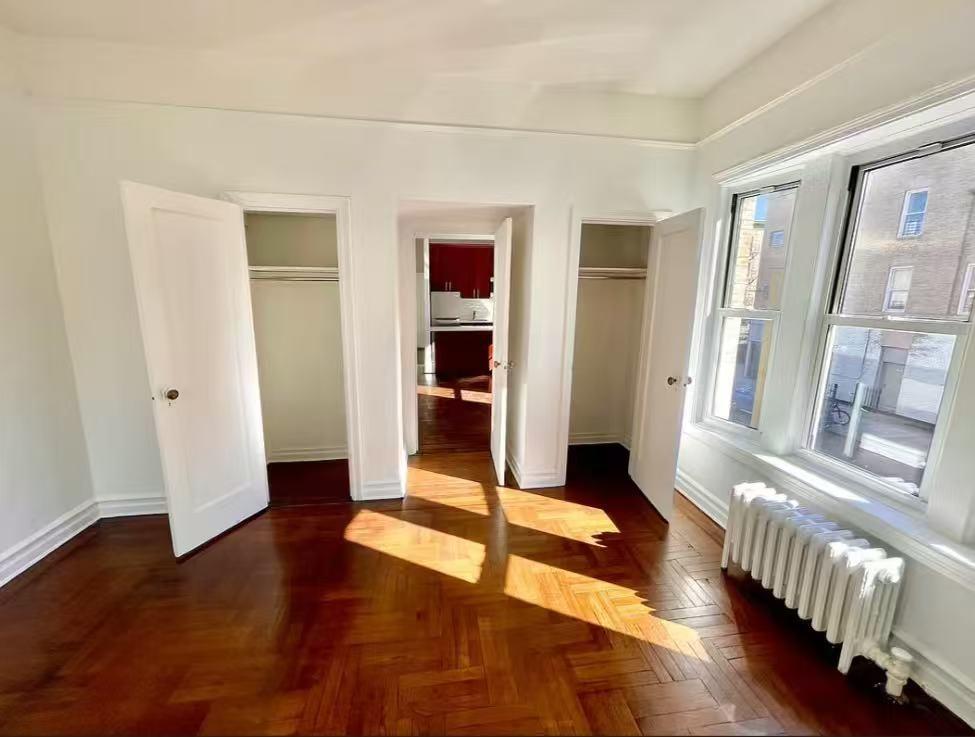 209 Hawthorne Street Brooklyn, NY 11225 - Photo 3 of 4 a view of entryway with wooden floor