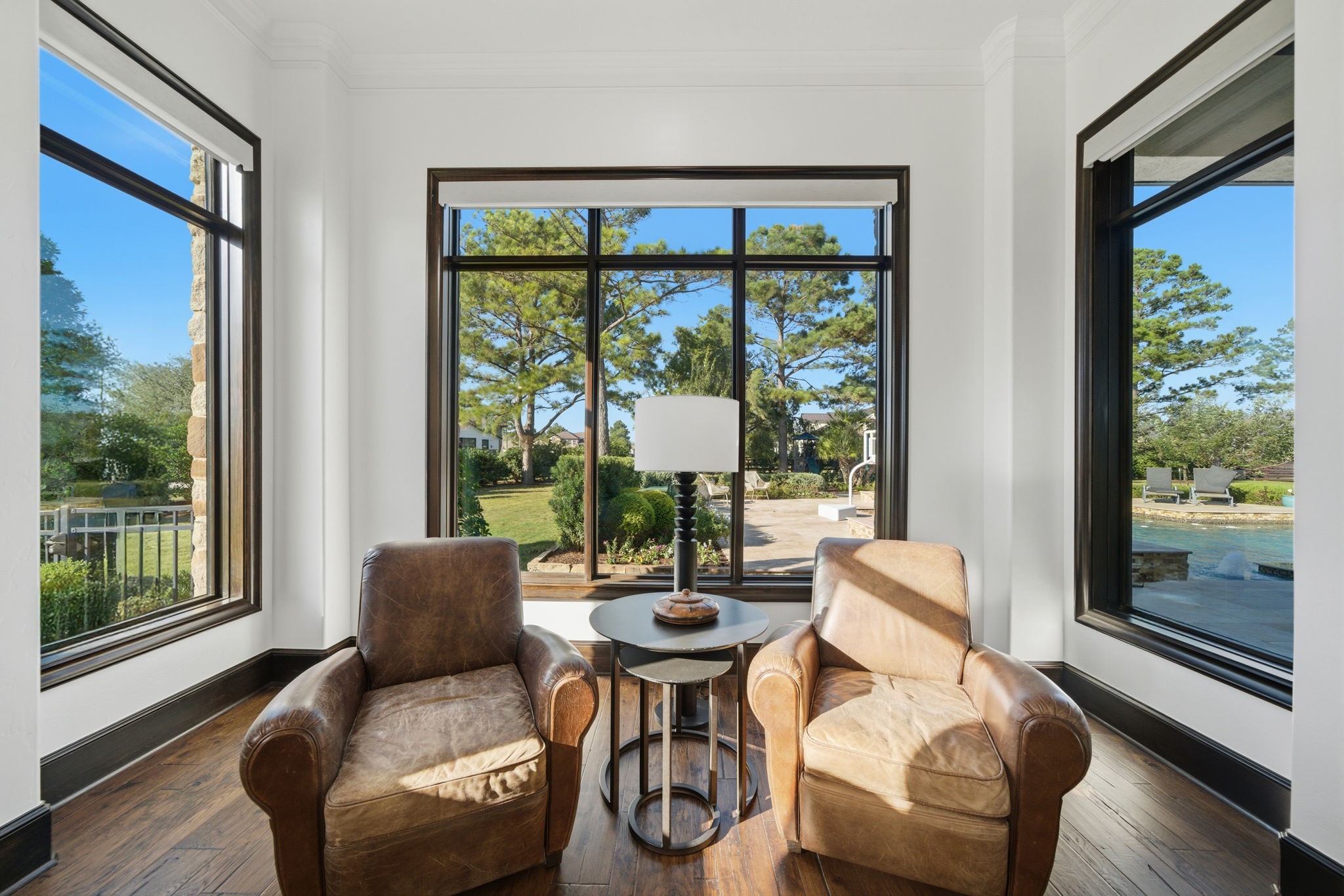 15 Royal King Road Tomball, TX 77377 - Photo 21 of 50 a living room with furniture and a large window