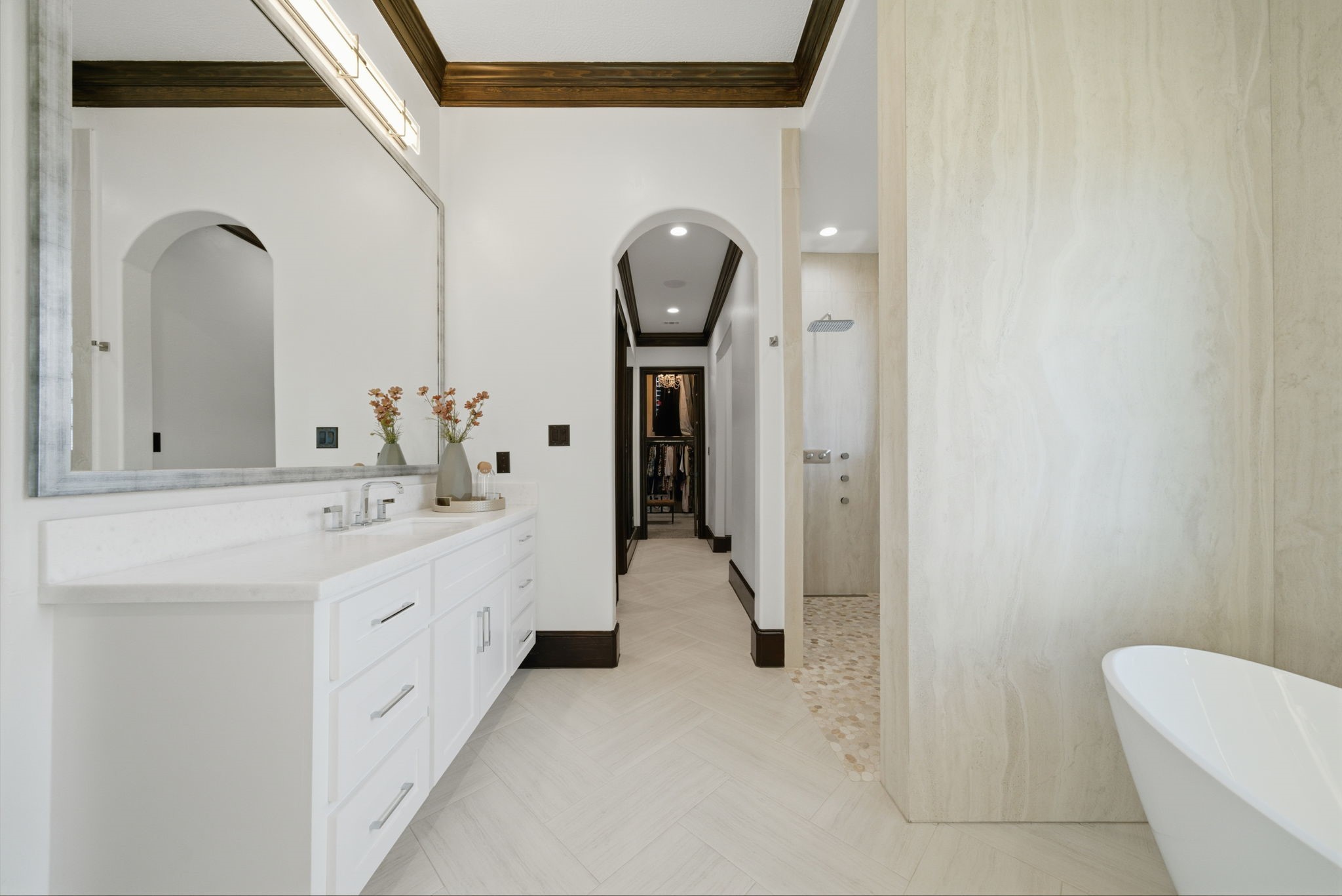 15 Royal King Road Tomball, TX 77377 - Photo 23 of 50 a spacious bathroom with a double vanity sink and a mirror
